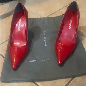Red patent leather 3 1/2” heels with dust bag.